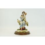 Capodimonte Style Hand Painted Figure Group - Mother and Child, Raised on an Oval Shaped Wooden