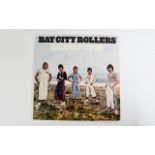 Bay City Rollers, 5 autographs on an LP,