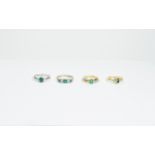 Four Assorted Emerald Set Rings.