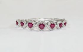 Heart Cut Ruby Bangle, seven graduated r