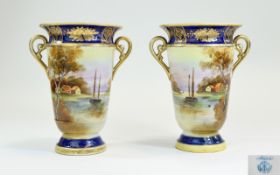 Noritake Fine Pair of Hand Painted Twin Handle Vases. c.1920's with Painted Scenes of Houses on a