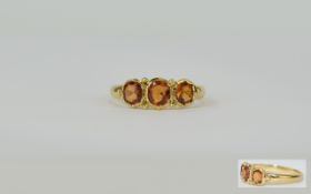 18ct Gold Brazilian Imperial Topaz Set Ring. Marked 18ct.