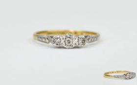 18ct Yellow Gold and Platinum Three Stone Diamond Illusion Set Ring marked 18ct and platinum.