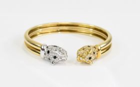 A Superb 18ct Gold Leopards Head Bangle,