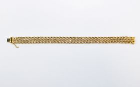 A Very Nice Quality Ladies 18ct Yellow Gold 3 Strand Bracelet, weave design. Marked 750.