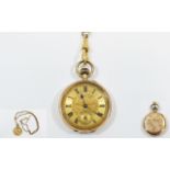 Antique 14ct Ornate Gold Cased Ladies Open Faced Pocket Watch with ornate gold dial.