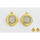 A 22ct Gold Pair of Middle Eastern Earrings set with antique Islamic silver coins marked 22ct. 32.