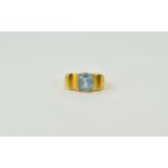 18ct Gold Unusual Shaped Single Blue Stone Dress Ring. Marked 750. Ring size P. 5.3 grammes.