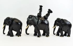 Antique - Well Made and Heavy Trio of Ebony Elephant Tusks and Feet. c.1900. One Elephant with