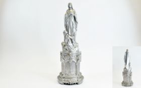 Musical Figure Of The Madonna Ornate cast metal, silver tone figure with internal musical box.