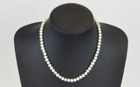 A Nice Quality Single Strand Cultured Pearl Necklace with 18ct gold clasp, fully hallmarked.