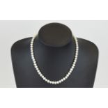 A Nice Quality Single Strand Cultured Pearl Necklace with 18ct gold clasp, fully hallmarked.