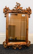 Bevelled Glass Mirror In Ornate Yellow Gilt Frame Small mirror with decorative Rococo yellow gold