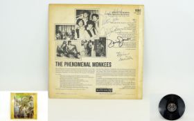 The Monkees (4) Autographs on LP including Davy Jones, Dolenz, Turk, Nesmith.