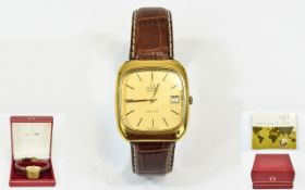 Omega Deville Gold Plated Quartz Day Just Gents Wrist Watch on an attached tan leather strap,