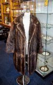 Musquash Fur Coat Mid length coat with side seam pockets,
