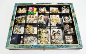 Collection Of Vintage Earrings Housed in green and gilt painted display box.