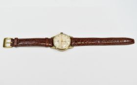 Rolex Tudor 9ct Gold Cased Mechanical Gents Wrist Watch with attached leather strap.