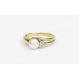 Ladies 9ct Gold Set Pearl and Diamond Ring in very nice as new condition, fully hallmarked.