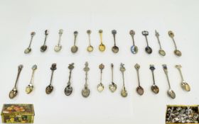 Tin Containing A Collection Of Souvenir Spoons Some With Enamelling,