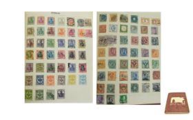 Very old spring back stamp album. Very good all rounder.