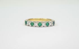 18ct Gold Set Emerald and Diamond Dress Ring set with 5 emeralds interspaced with 4 round cut