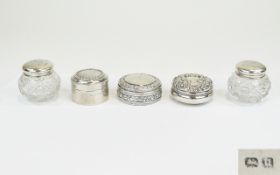A Collection of Silver Lidded Pill Boxes ( 3 ) and a Pair of Silver Lidded Cut Glass Small Jars.