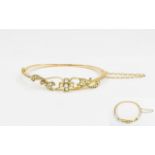 Antique Period 15ct Gold Hinged Bangle set with seed pearl and attached gold safety chain.