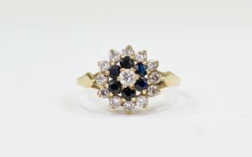 Ladies 9ct Gold Set Diamond and Sapphire Cluster Ring 'flower head design'.