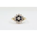 Ladies 9ct Gold Set Diamond and Sapphire Cluster Ring 'flower head design'.