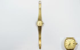 Zenith Ladies 9ct Gold Day Just Quartz Wrist Watch with integral 9ct gold bracelet.