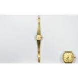 Zenith Ladies 9ct Gold Day Just Quartz Wrist Watch with integral 9ct gold bracelet.