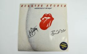 The Rolling Stones (2) autographs on record sleeve, Mick Jagger and Ronnie Wood.