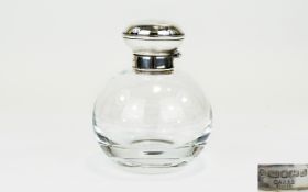 Elizabeth II Silver Topped and Banded Perfume Bottle complete with inner top,