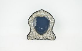 Art Nouveau Style Embossed Heart Shaped Silver Photo Frame with velvet back.
