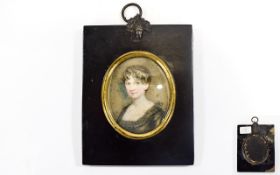 Victorian Hand Painted MIniature Portrait of a young woman with brown hair wearing a dark coloured