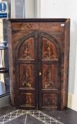 Large Distressed Dark Wood Corner Cabinet. Possibly Georgian. Comprising two curved, panelled