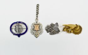 A Small Collection of Vintage and Antique Silver And Bone Brooches and Medals/Fobs (4) in total.