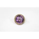Antique 9ct Gold Brooch Set with a Large Circular Faceted Amethyst Surrounded by Seed Pearls,