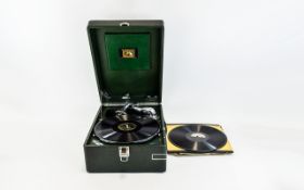 His Masters Voice Portable Gramophone Housed in original racing green case,