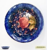 William Moorcroft Signed Footed Bowl ' Pomegranates ' Design on Blue Ground. c.1920's. 8.