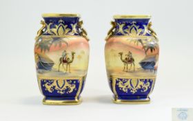Noritake Fine Quality Pair of Hand Painted Twin Handle Vases with Painted Scenes of Desert