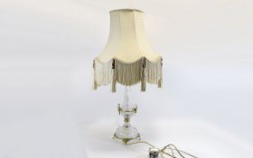 A Modern Elegant Cut Glass Table Lamp, Supported on a Lacquered Brass Base,