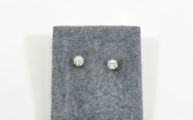 A Pair of Round Brilliant Cut Diamond Stud Earrings, Diamonds are Bright and Lively,