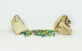 Two Bags Of Marbles