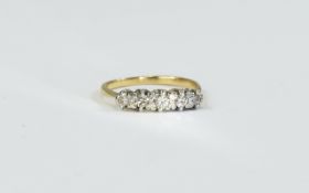 18ct Gold and Platinum Set Five Stone Diamond Ring.