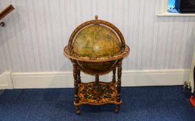 Globe Drinks Cabinet Large ornate globe novelty drinks cabinet on castors with intricate decoration.