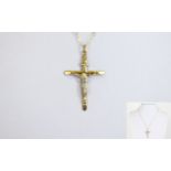 A 9ct Gold Cross and Chain. Fully Hallmarked. Chain 20 Inches In Length & Cross 1.5 Inches High.