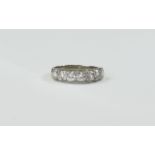 18ct White Gold 7 Stone Diamond Ring. The Round Brilliant Cut Diamonds of Good Colour and Clarity.