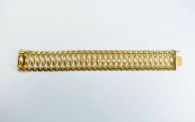 A Superb 18ct Gold Wide Bracelet with Classical Design and Key Borders. Marked 750, 37.8 grams.